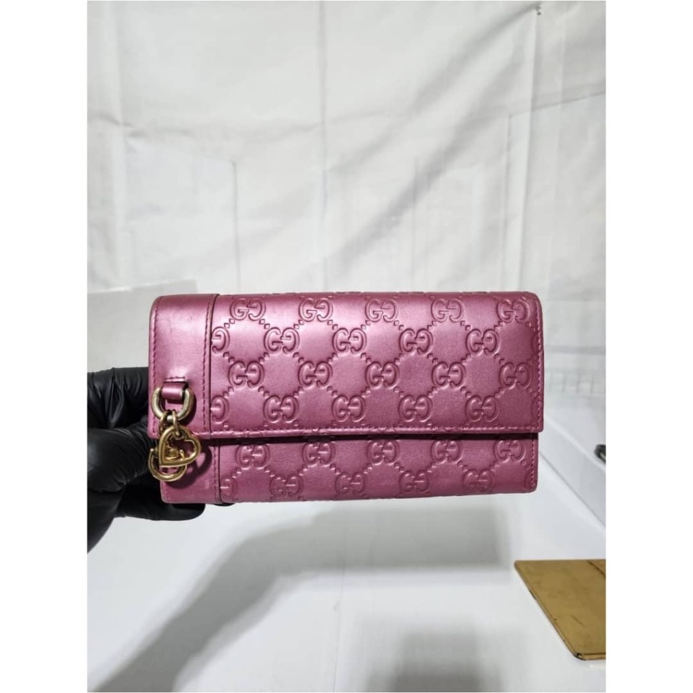 Gucci Metallic Pink GG Embossed Leather Wallet with Gold Heart Charm